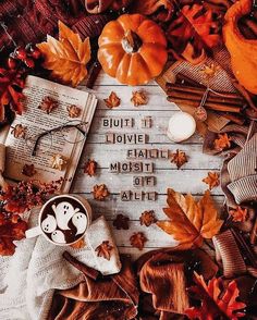 an autumn scene with pumpkins, leaves and books on the ground that reads but it's liovie fraatie most of all