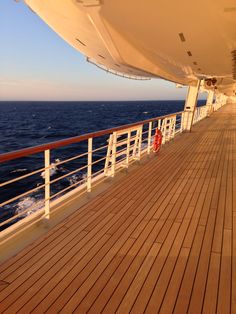 the deck of a cruise ship looking out at the ocean