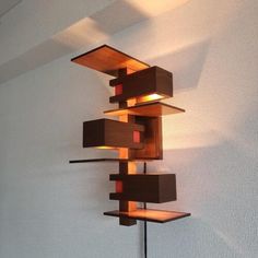 a lamp that is on the side of a wall