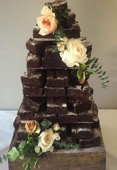 there is a cake made out of brownies and flowers