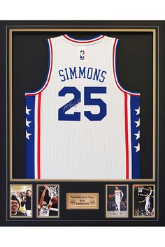 an autographed basketball jersey is displayed in a black frame with the number 25 on it