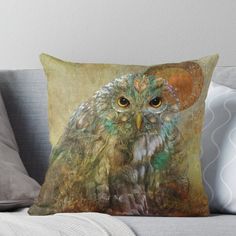 an owl sitting on top of a couch