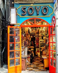 an entrance to a store with many items on display