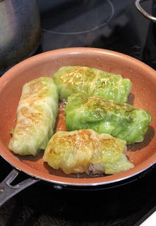 some food is cooking in a pan on the stove