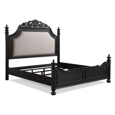 a black bed frame with an intricate headboard and foot board on the bottom side