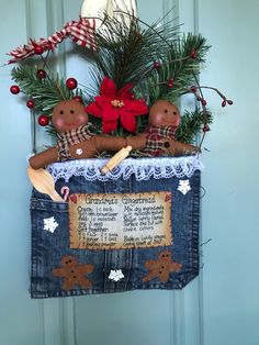 a christmas decoration hanging on the front door