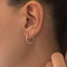 Upgrade your accessory game with our classic 14k gold mini hoop earrings, available in three sizes to suit any style. These timeless hoops are perfect for everyday wear or special occasions, offering versatility and elegance to any outfit. Crafted from 14k gold, they feature a lightweight design for comfortable all-day wear. Whether you prefer a subtle look or a bold statement, these mini hoops are a must-have addition to your jewelry collection. Shop now to find your perfect pair! ∙EARRING DETA Mini Hoop Earrings, Earrings Dainty, Hypoallergenic Earrings, Classic Gold, Jewelry Earrings Hoops, Perfect Pair, Solid Gold, Gold Color, Jewelry Collection