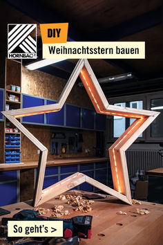 a wooden table topped with a star shaped light