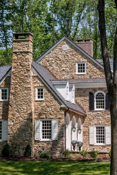 an image of a stone house on pinterest