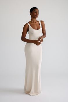 Indulge in the comfort and style of this elegant knit maxi dress. Crafted from premium quality yarns, it features a scoop neckline that adds a touch of sophistication to your wardrobe. Made from a heavy-weight stretchy fabrication, this modest design flatters the figure in an alluring way. Loungewear Dresses, Knit Maxi Dress, Maxi Knit Dress, Heavy Weight, Scoop Neckline, Knit Dress, Long Sleeve Tops, Vanilla, Knitwear