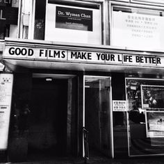 a black and white photo of a building with the words good films make your life better