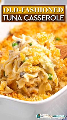 A close-up of old-fashioned tuna casserole with egg noodles, peas, and a golden breadcrumb topping, scooped from a casserole dish. Classic comfort food for all occasions.