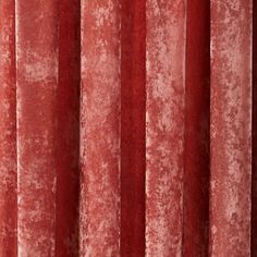 red velvet curtains with vertical pleating