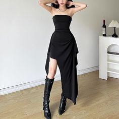 Indulge in luxury with our Black Off The Shoulder Asymmetrical Dress. Showcasing a dramatic off-the-shoulder and asymmetrical design, this midi-length dress exudes sophistication and style. Crafted from black polyester and spandex, it offers both comfort and elegance, making it perfect for those seeking an alternative aesthetic. Dramatic off-the-shoulder design Asymmetrical hem for a bold, stylish look Midi length for a sophisticated silhouette Made from a comfortable polyester and spandex blend Ideal for alternative fashion aesthetics Tube Midi Dress, Techno Fashion, Irregular Skirt, Dresses Style, Goth Dress, Black Party Dresses, Fashion Aesthetics, Style Spring, Asymmetrical Design