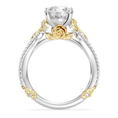 a rose shaped engagement ring with two tone gold accents