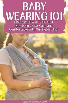 a woman holding a baby wrapped in a grey wrap with the words, baby wearing 101