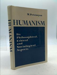 a book about humanism is sitting on a table