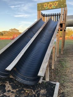 a slide that is sitting in the dirt