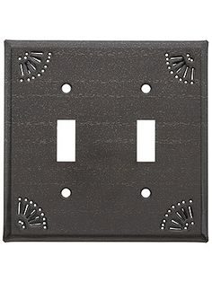 an outlet cover with two lights on each side and one light switch plate in the middle