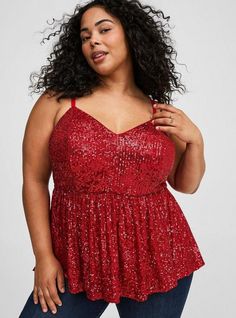 FIT Model is 5'10” wearing size 2. . Measures 28” from shoulder (size 2). MATERIALS + CARE Sequin woven fabric. 96% polyester, 4% spandex. Dry clean only. Imported. DETAILS Deep v-neck. Sleeveless. Sequined detail. . Peplum detail. . The best plus size women's peplum sequin v-neck tank sleeveless & tops in jester red made of sequin. Rock your look from Torrid to Festivals like Coachella and Lollapalooza, a concert, a show, or just for fun! Torrid is your destination for cozy fall and winter clothes to keep you warm and comfortable. Red V-neck Holiday Top, Red Peplum Tops, Plus Size Peplum, New Street Style, Sleeveless Tops, Bra And Panty Sets, Sequin Top, Winter Clothes, Cozy Fall