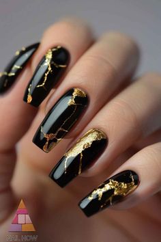 Golden Glam! These black acrylic nails with intricate gold accents offer a luxurious and elegant design. Perfect for making a statement at any event. Visit nailhow.com for more glamorous nail designs. Save this pin for your next nail appointment! Black Nails Inspo Elegant, Nail Black And Gold, Nail Art Designs Gold Glitter, Black And Golden Nails Design, Black And Gold Nail Art Designs, Black And Golden Nail Art, Golden Acrylic Nails, Nail Black Gold, Black Golden Nails