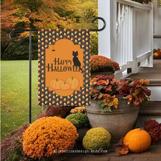 a happy halloween banner with pumpkins and gourds in front of a porch