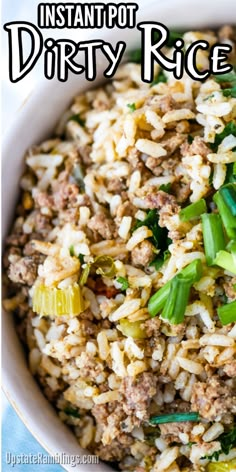 a bowl filled with rice and vegetables on top of a table