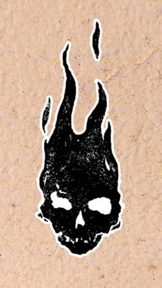 a black and white drawing of a skull on a piece of paper with the word hell written in it