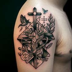 a cross and some birds on the shoulder