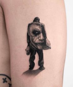 a person with a bag on their back is depicted in this tattoo design by the artist