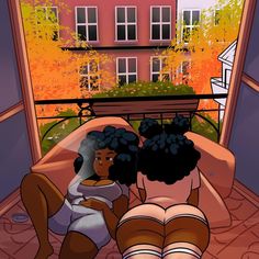 two black women sitting on a bed looking at each other