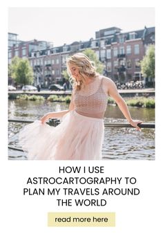 a woman in a pink dress standing on the edge of a body of water, with text overlay reading how use astrocartograph to plan travels around the world read more here