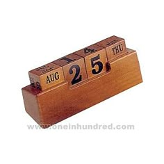 a wooden calendar with the date twenty five