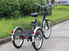 a bicycle with a basket is parked on the side of the road in front of some bushes