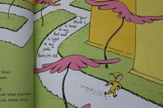 an open book showing the story of dr seuss