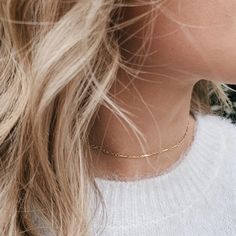 Dainty bar link choker necklace in your choice of Sterling Silver, 14k Gold Fill, or 14k Rose Gold Fill with matching lobster clasp and 2" extender. Perfect for layering or on its own! • You choose your necklace length• Includes a 2" built in extender• All necklace components are Sterling Silver or 14k Gold Filled (including jump rings). No plating.• All jewelry is completely lead + nickel free!• All orders include one (1) complimentary polishing cloth to help you keep your items looking shiny a Dainty Bar Necklace, Chain Layering, Silver Bar Necklace, Necklace Extender, Gold Bar Necklace, Layering Necklace, Rose Gold Necklace, Gold Filled Jewelry, Link Necklace