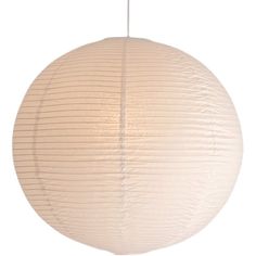 a round white paper lantern hanging from a ceiling