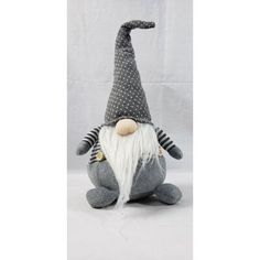 a gray and white gnome stuffed animal