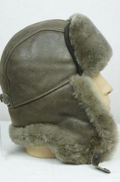 GORGEOUS 100% REAL SHEEPSKIN SHEARLING LEATHER RUSSIAN USHANKA TRAPPER TROOPER AVIATOR BOMBER HAT. EXCEPTIONAL QUALITY! REAR TO FIND! THE BEST PRICE ON EBAY !!! !!!!!!!!!   Different colors are available in different listings    !!!!!!!! UNISEX FOR MEN AND WOMEN !!!!!  PLEASE SEE SIZING INFO BELOW   !!!!! !! US Seller. Item location is USA, and will be shipped the next day after payment is made !! Make sure you see my other matching shearling products like coats, jackets, vests, mittens, gloves, Russian Ushanka, Trooper Hat, Hunt Coat, Shearling Slippers, Trapper Hat, Shearling Vest, Trapper Hats, Military Outfit, Shearling Jacket