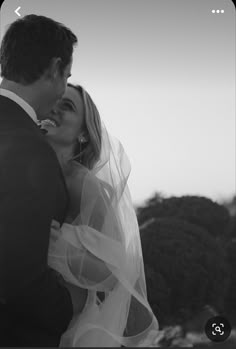 black and white photograph of a bride and groom