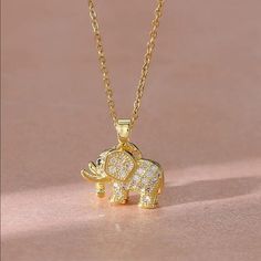 Brand New Women's Gold Elephant Diamond Necklace 14k Gold Plated Sterling Silver Genuine 1ct Lab Created Radiant Cut Diamonds Measurements: Chain Length - Adjustable 16" - 18" Pendant Size - .75" X .75" Retail Price $350 Buy With Confidence From A Trusted Seller With A 99%+ Feedback Rating! A0165 (Id-516-1-) Gold Elephant Pendant, Elephant Pendant Necklace, Flower Statement Necklace, Mountain Necklace, Gold Elephant, Spike Necklace, Layered Necklaces Silver, Elephant Necklace, Elephant Pendant