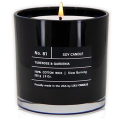 a candle that is sitting in front of a white background with the label on it