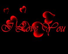 the word love you written in red ink with hearts floating around on a black background