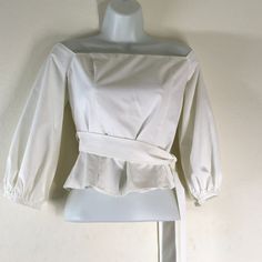 Lucy Paris White Square Neckline Balloon 3/4 Sleeve Over Shoulder Top Side Wrap Tie Crop Top Woman's Pull On Side Zip Crop Size Small Nwot Pit To Pit 16" Length 14" Thank You For Checking Out My Closet! We Love To Bundle And Offer Discounts, Please Make Sure To Take A Peek At Our Other Listings! If You Have Any Questions, Please Feel Free To Ask, We Are Here To Help! Cotton Tops With 3/4 Sleeves For Day Out, Cotton Blouse With 3/4 Sleeves For Day Out, Half-sleeve Cotton Blouse For Brunch, Cotton Half Sleeve Blouse For Brunch, Half Sleeve Cotton Blouse For Brunch, Chic White Top With 3/4 Sleeves, Chic White 3/4 Sleeve Top, Fitted 3/4 Sleeve Top For Brunch, Cotton 3/4 Sleeve Tops For Brunch