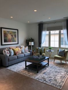 the living room is clean and ready for guests to use it as an office space