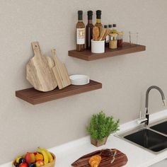 two wooden shelves above a kitchen sink filled with fruits and vegetables next to a cutting board