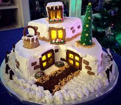 a cake that is shaped like a house with windows and lights on it's sides