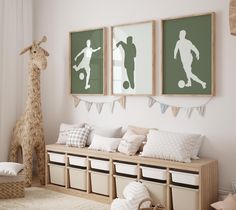 a child's room decorated in neutrals and whites with pictures on the wall