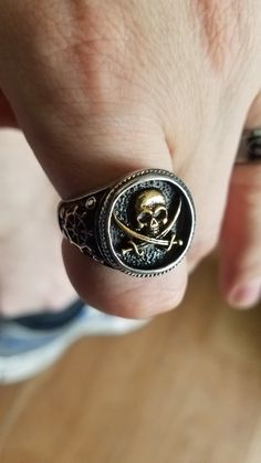 Retro Pirate Stainless Steel Skull Ring – GTHIC Symbolic Stainless Steel Skull Ring As Gift, Adjustable Skull Print Rings For Gift, Vintage Skull Print Jewelry As Gift, Vintage Skull Print Jewelry Gift, Stainless Steel Skull Ring As Gift, Vintage Skull Print Jewelry For Gift, Gift Skull Ring In Stainless Steel, Engraved Metal Skull Ring As A Gift, Gift Stainless Steel Skull Ring