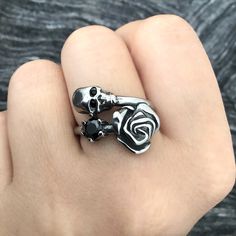 Beautifully crafted Gothic Rose with Skull ring is made of 316L Stainless steel and set with Black Cubic Zirconia stone. Width of the ring -17mm Ships in a gift box Rose And Skull, Black Rose Ring, Gothic Ring, Gothic Rose, Ring Flower, Nail Ring, Magical Jewelry, Gothic Rings, Rose Ring